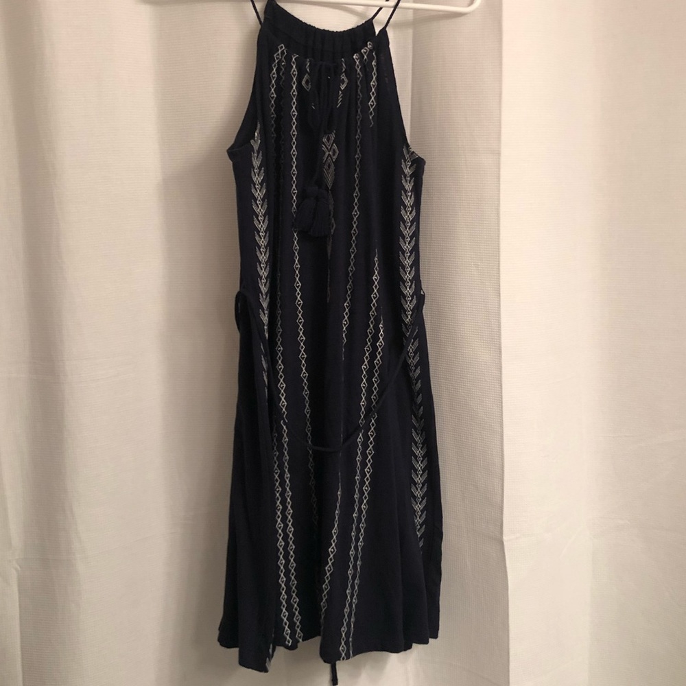 Blue sundress with white knit embroidery detail